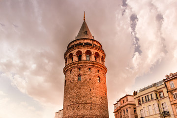 Obraz premium View over Galata Tower(Turkish: Galata Kulesi) (Galata Kulesih) Christea Turris is a medieval famous landmark stone tower architecture, in beyoglu, Istanbul.ISTANBUL/TURKEY- FEBRUARY 18,2017