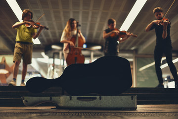 playing on music instruments in metro