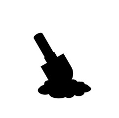 Black silhouette of shovel icon in the soil on white background.