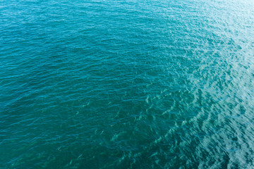 Texture of calm azure sea, background