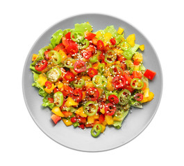 Plate with tasty vegetable salad on white background