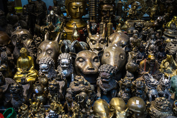 Selection of Chinese statues and souvenirs displayed in a gift shop at the Cat Street, Hong Kong, Sheung Wan