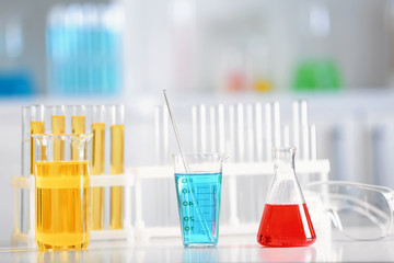 Chemical glassware on table in laboratory