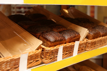 Fresh tasty bread in wicker baskets