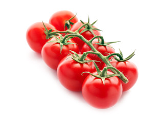 Ripe cherry tomatoes on white background