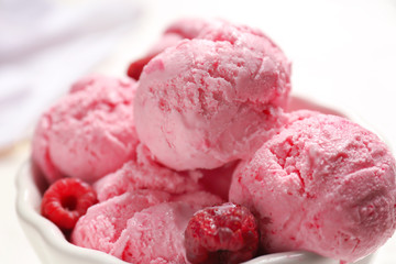 Bowl with delicious raspberry ice-cream, closeup