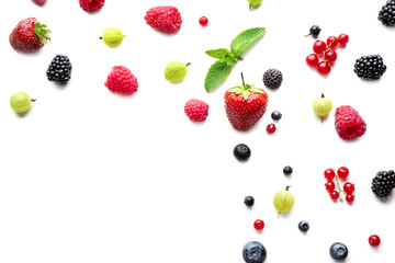 Delicious ripe berries on white background, top view