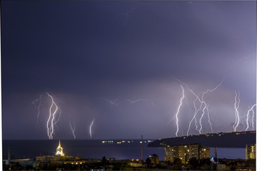 Naklejka na ściany i meble Storm over Varna, Bulgaria, with lightnings and flashes.