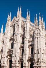 Fototapeta premium Main side of the Milan Cathedral from the corner