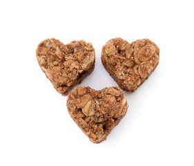 Oatmeal heart dessert isolated on white background