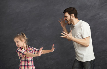 Father and daughter arguing and screaming