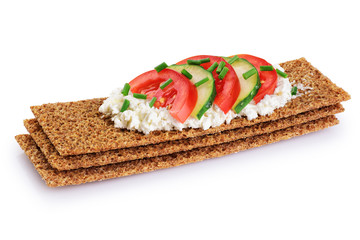 Crispbread with cheese, tomato, cucumber and onion isolated on white background.