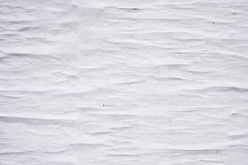 Alte verwitterte Papiertapete mit falten als ein Hintergrund