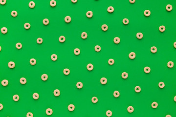 Cereal rings on green background
