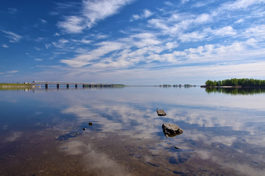 Amazing view to bridge and dam across the Dnieper river, Cherkasy, Ukraine at sunny day