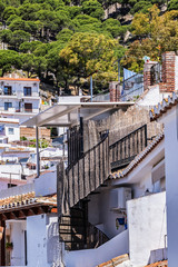 Unique white painted village of Mijas. Mijas (not far from Malaga) - Spanish hill town overlooking the Costa del Sol, known for its white-washed buildings. Mijas, Andalusia, Spain.