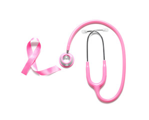 Pink ribbon with stethoscope on white background. Breast cancer concept