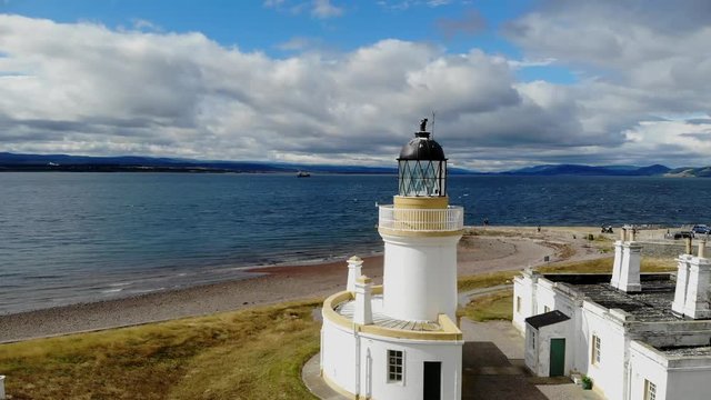 Flight over Cromarty Lighthouse at Cromarty Firth in the Scotland - aerial footage