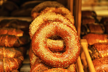 Fresh bagels on shelf in bakery