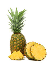 Delicious cut and whole pineapples on white background