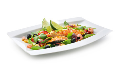 Plate with tasty fish and fresh salad on white background