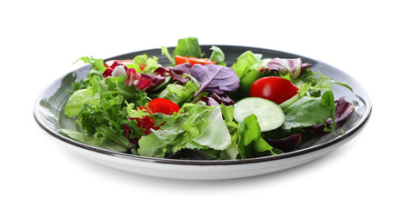 Plate with fresh vegetable salad on white background
