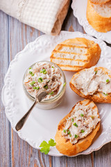 Pieces of fried bread with fish pate, top view