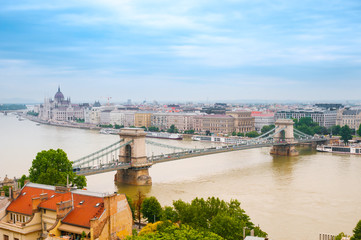 Fototapeta na wymiar City landscape with Szechenyi Chain Bridge and building of Hungarian Parliament