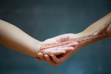 Student being physically punished by teacher with a ruler on on wooden blackboard or chalkboard...