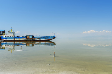 Fototapeta na wymiar Old ferry on Urmia Salt Lake. Iran