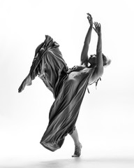 Beuatiful female dancer. White background