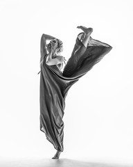 Beuatiful female dancer. White background