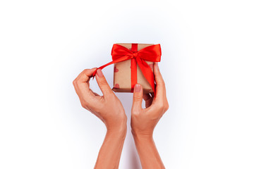 Hand woman holding gift box on isolated with clipping path.