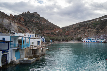 Fototapeta na wymiar Bay of Firopotamos with Traditional Greek Fishermen Houses in Milos, Cyclades, Greece