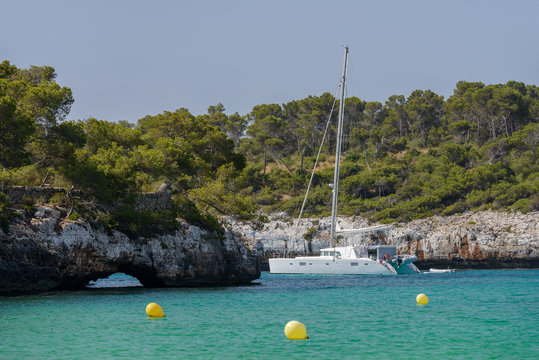 Fototapeta white yacht in a beautiful sea lagoon