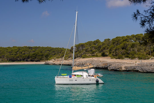 Fototapeta white yacht in a beautiful sea lagoon