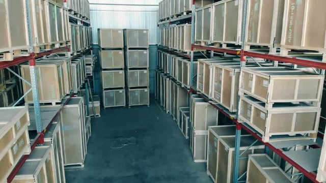Boxes stored in rows, close up.
