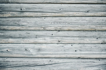 the wall of an old wooden house.
