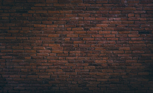Old red brick wall texture background,brick wall texture for for interior or exterior design backdrop,vintage dark tone.