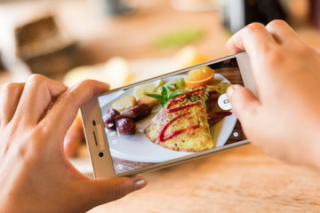 taking photo at breakfast