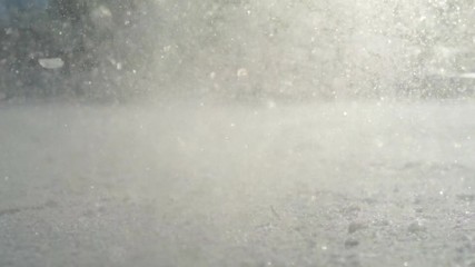 CLOSE- UP: Man ice skating and stopping