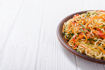 Asian noodles salad in bowl