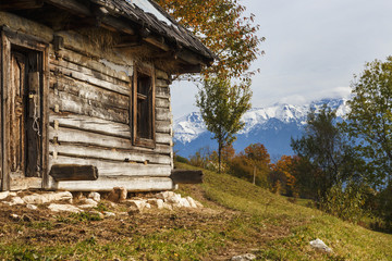 Colorful autumn landscape in the mountain village Magura, in the Carpathian mountains. Romania.