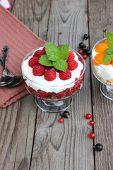Dessert cups of Pecheneg, cottage cheese, raspberry, and apricot