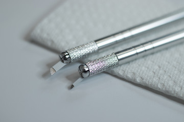 Fototapeta premium Microblading tools used for applying permanent eyebrow makeup