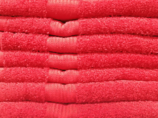 folded red towels background