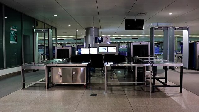 Checkpoint at the airport. X-ray scanner with monitors for detecting dangerous items of passengers, Saigon, Vietnam.