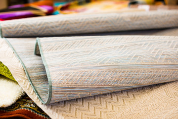 Image of wattled organic bamboo rugs at interior shop