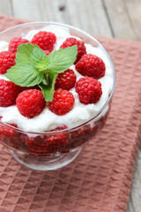 Dessert cups of Pecheneg, cottage cheese, raspberry, and apricot