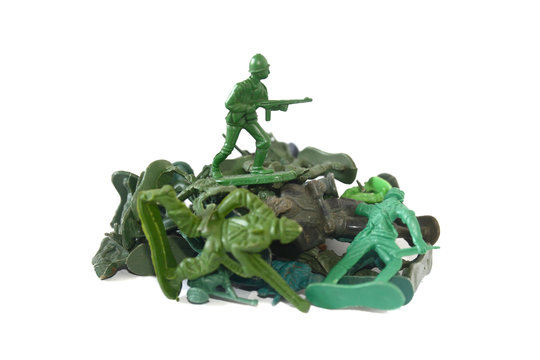 small green soldier model action shooting gun with other soldier model onthe floor, white background
